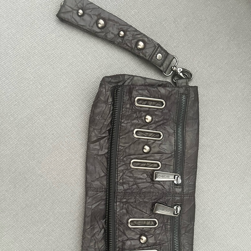 Bebe cute smoky black wristlet. Never used.